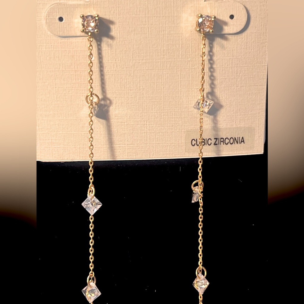 Borrowed and blue sweeping earrings. Cubic zirconia stone.